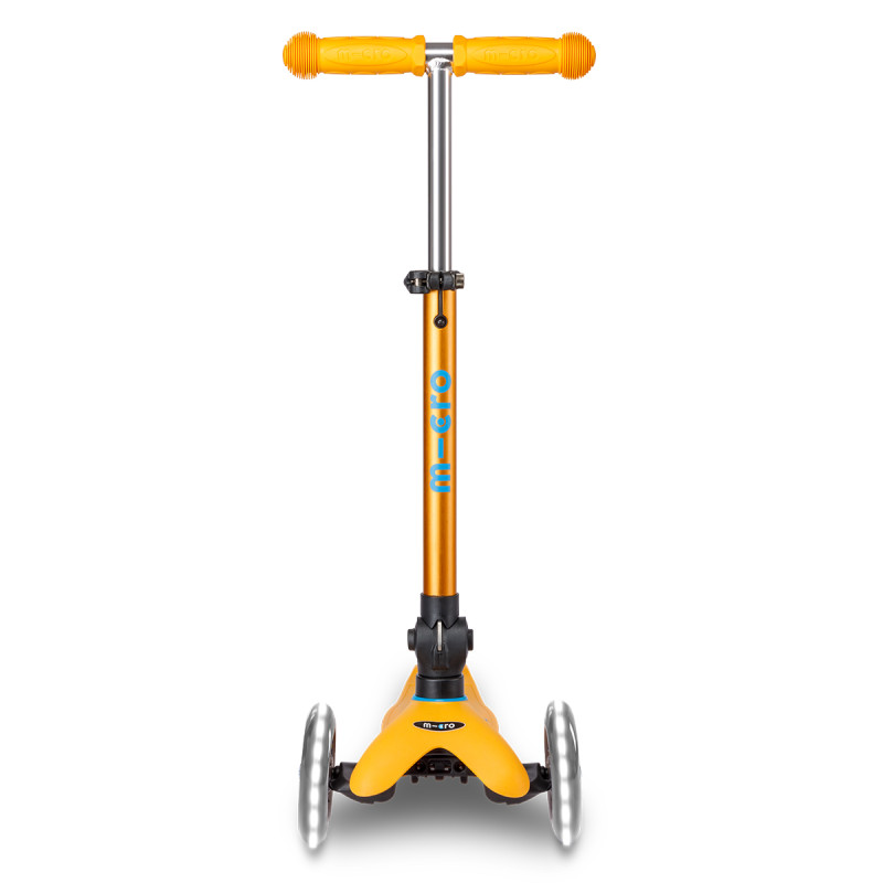 Самокат MICRO серії "Mini Deluxe Foldable LED" – АБРИКОСОВИЙ (складаний, до 50 кг (kg), триколісний, світло)