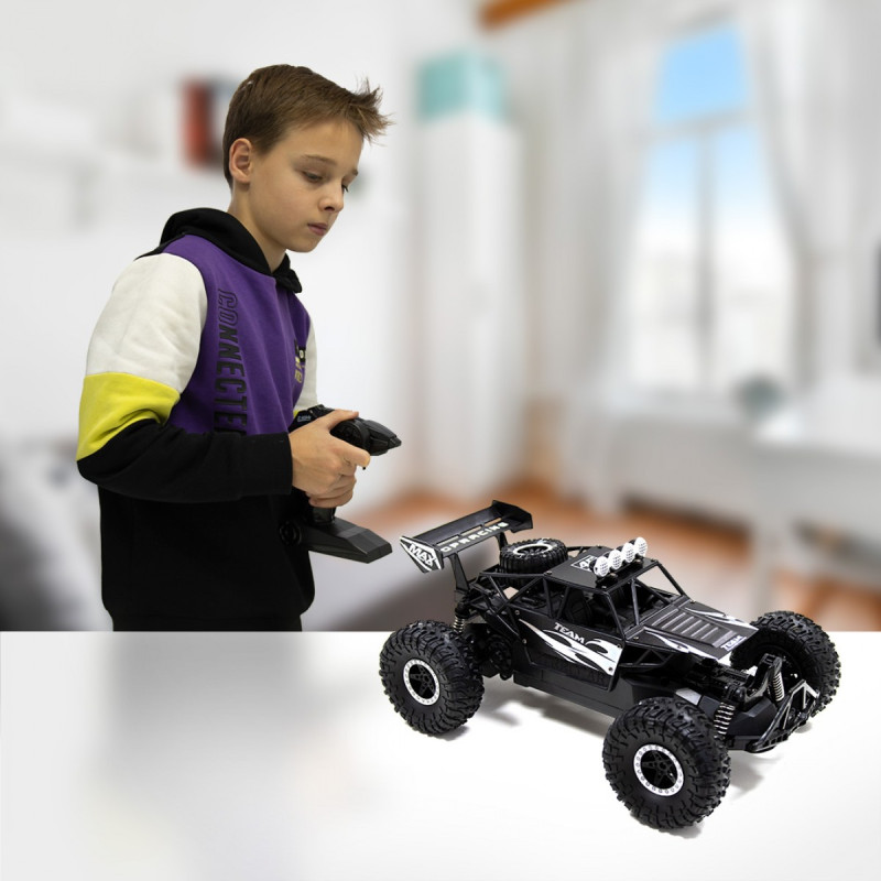 Автомобіль OFF-ROAD CRAWLER з р/к - SPEED TEAM (чорний, метал. корпус, акум. 6V, 1:14)